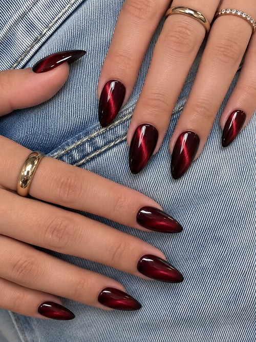 Cherry Spell press-on nails worn on model Daisam