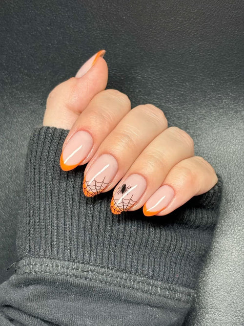 Diseño Araña Naranja en mano