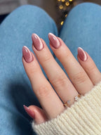 Pink Velvet press-on nails worn on model Daisam