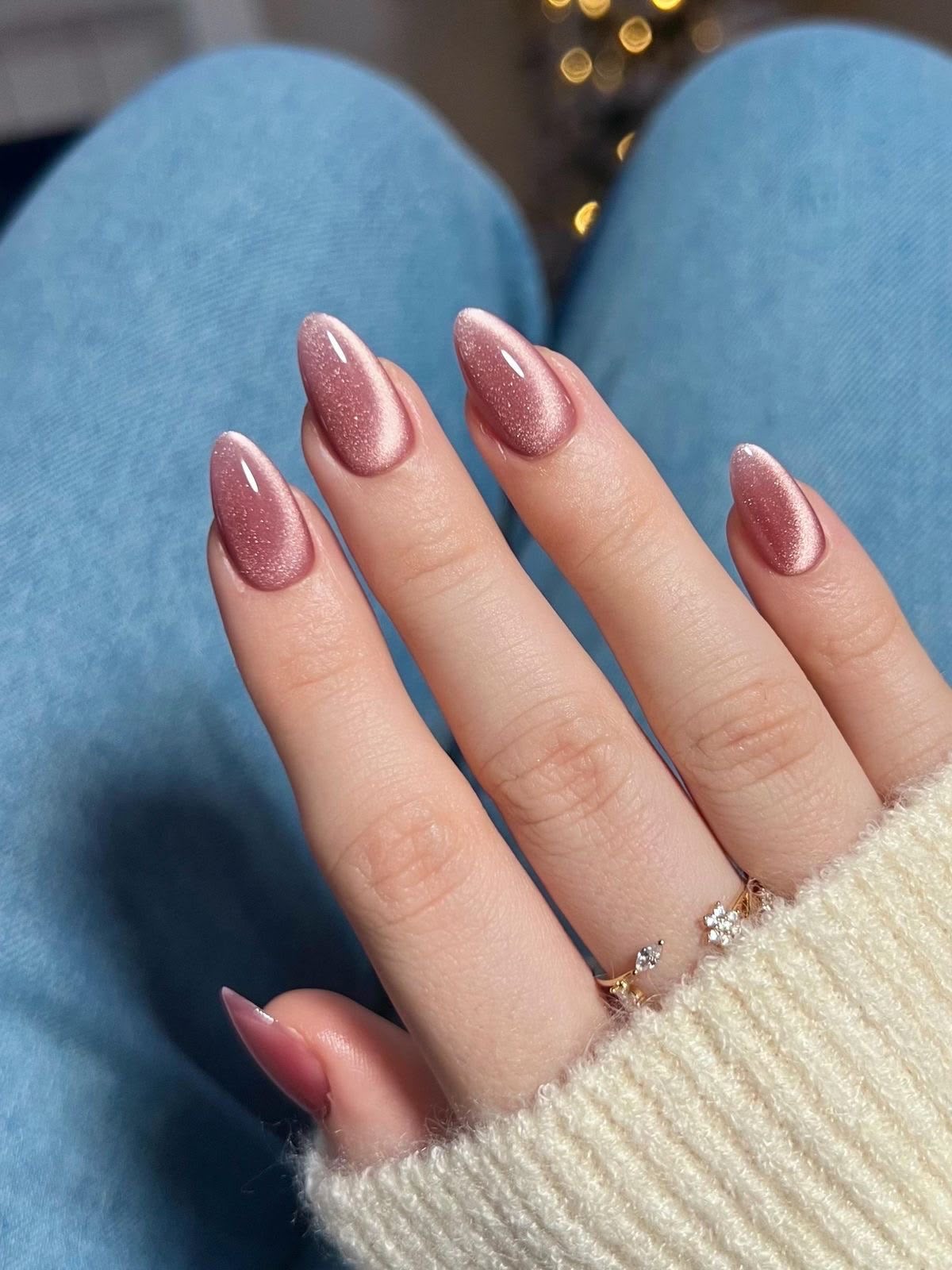 Pink Velvet press-on nails worn on model Daisam